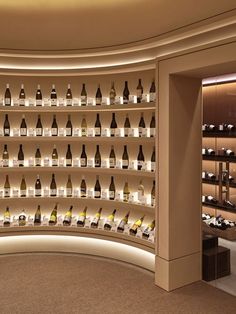 there are many bottles of wine on the shelves