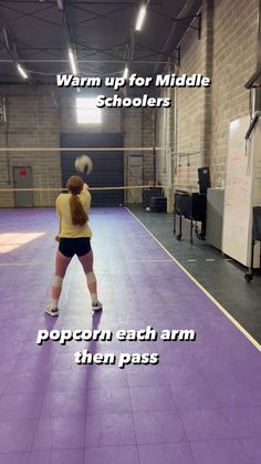 a woman is hitting a ball in an indoor volleyball court with the words warm up for middle schoolers popcorn each arm then pass