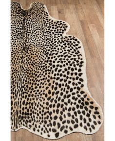 an animal print rug is shown on the floor