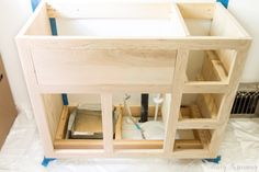 the unfinished cabinet is being built and ready to be installed