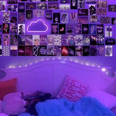 a bed room with a neatly made bed and purple lights on the wall above it