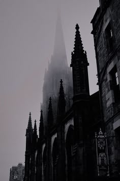 an old gothic church in the fog