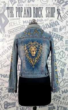 Handpainted Denim jacket with a captivating Lion motif and metal studs in antique gold.The sleeves and front also feature motifs.Check it out on our etsy store. Gold Graffiti, Rocker Girl, Gold Lion, Blue Denim Jacket