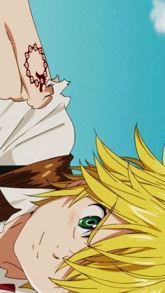 two anime characters with blonde hair and green eyes