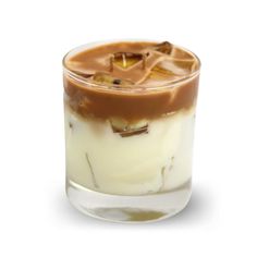 an ice cream dessert in a glass on a white background