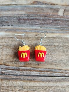 These resin earrings are lightweight and feature french fries in a fed container with an M on the front and back. About the size of a nickel. Silver plated and nickel free ear wire. Miniature Food Earrings, Art Modeling, Cactus Jewelry, Cactus Necklace, Blue Gemstone Earrings, Earrings Ideas, Cactus Earrings, French Fry, Food Earrings