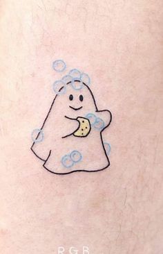 a cartoon character with soap bubbles on his stomach is depicted in this tattoo art design