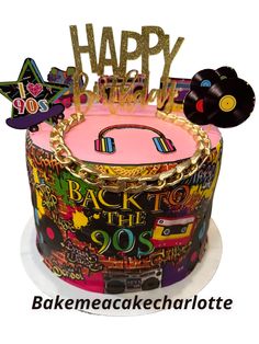 a birthday cake decorated with the theme of back to the 90's