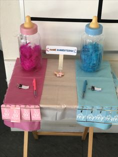 the table is set up with pink and blue items