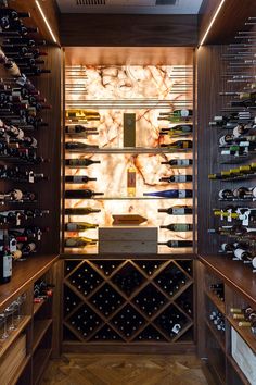 a wine cellar filled with lots of bottles