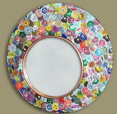 a calendar with a plate made out of many different colored bottle caps on the front