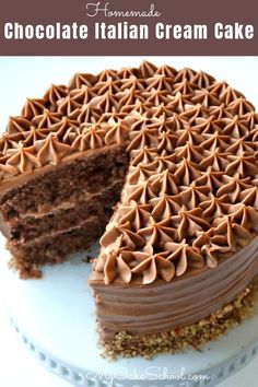 a chocolate italian cream cake with one slice cut out