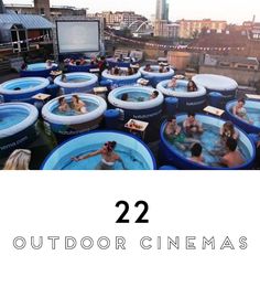 an outdoor cinema with people swimming in it