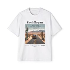 This T-Shirt features an oversized fit perfect for a relaxed and comfortable look. Ideal for fans of Zach Bryan and country music, this tee exudes a laid-back vibe. Great for casual outings or lounging at home, this tee is a must-have for music lovers and those seeking a cozy wardrobe staple. Perfect for music festivals, concerts, or everyday wear. Product features - 100% Carded cotton for durability - Dropped shoulders for a relaxed fit - Shoulder-to-shoulder tape for stability - Double needle stitch on hems for longevity - Sewn-in label for added quality Care instructions - Machine wash: cold (max 30C or 90F) - Non-chlorine: bleach as needed - Tumble dry: low heat - Iron, steam or dry: low heat - Do not dryclean Cozy Wardrobe, Style Graphic Tee, Zach Bryan, Tee Shirt Homme, Gift For Music Lover, Music Festivals, Music Lover, Music Lovers, Vintage Stil