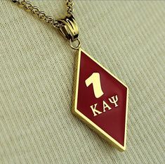 Kappa Alpha Psi necklace/Jewelry and charm A beyond stunning Kappa Alpha Psi necklace and charm made with 18K solid gold Plated. This pendant is made to last for generations and generations, perfect for that special Kappa Alpha Psi member. The ultimate gift to show off your fraternity pride is here! * Official Kappa Alpha Psi Licensed Product: passed through examination and requirements by the Fraternity as a whole. *Pedant Size (About a size of a nickel) 1 Height .75 inch wide * Chain Size 22 i Nupes Kappa Alpha Psi Gifts, Nupes Kappa Alpha Psi, Probate Gifts, Black Fraternities, Fraternity Gifts, Kappa Alpha Psi Fraternity, Men's Business Outfits, Kappa Alpha Psi, Grand Prairie