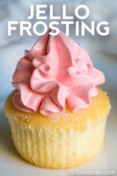 a cupcake with pink frosting on top and the words jello frosting above it