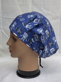 "Modern/Sleeker pattern on popular classic NOT a \"Poufy\" old style bouffant REGULAR Style: 16\" bouffant diameter with 6 pleats for sizing, expansion, contraction EXTRA FABRIC Style: 18\" bouffant diameter with 6 pleats for sizing, expansion, contraction See PICTURE of Regular style scrub hat on top of Extra Fabric style scrub hat ♥NO RETURNS or REFUNDS or EXCHANGES♥ Sizing Reference: Mannequin bald head circumference is 22.5 inches Bouffant Scrub Hat-Surgery-Robotics-Navy-Will be made like th Free Surgical Cap Pattern, Euro Scrub Hat Pattern, Hat Sewing Pattern, Hat Sewing, Bouffant Scrub Hat, Operating Room, Bald Heads, Bald Head, Surgical Hats