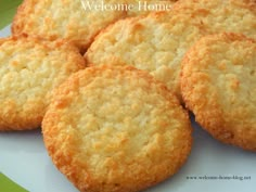 some biscuits are sitting on a white plate