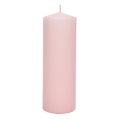 a pink pillar candle on a white background