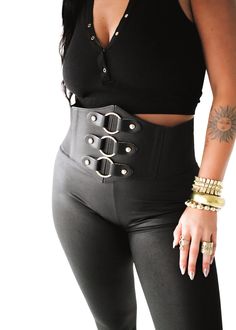 We know you've seen statement belts making a comeback. And you might be thinking, but can I pull that off? The answer is YES. And we're here with just the right. pieces to show you how. Elastic Back with Faux Leather Measures 38.5" from Snap to Snap Naturally - Extends Comfortably to a 46" Waist Burnished Gold Hardware Edgy Black Belt Buckle With Removable Belt, Trendy Adjustable Corset Belt With Belt Loops, Trendy Corset Belt With Belt Loops For Party, Edgy Black Belt Buckles, Edgy Black Belt For Night Out, Statement Belts, Corset Plus Size, Statement Jewelry Necklace, Jewelry Casual