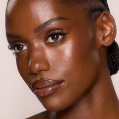 A ring light effect in a hydrating foundation stick! It blurs and smooths for a soft-focus skin glow! 14 Deep is a deep shade with neutral undertones. Choosing Foundation Shade, Skin Focused Makeup, Dewy Foundation Look, Black Beauty, Dewy Bronzed Makeup Glowing Skin, Foundation Dark Skin, Charlotte Tilbury Flawless Foundation Swatches, Luminous Silk Foundation Swatches, Poreless Skin