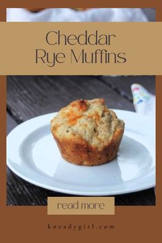 a close up of a muffin on a plate with the words, cheddar rye muffins read more