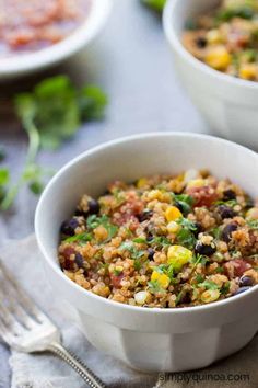 two white bowls filled with mexican quisadilla and garnished with cilantro