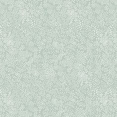 a light green and white wallpaper with small dots