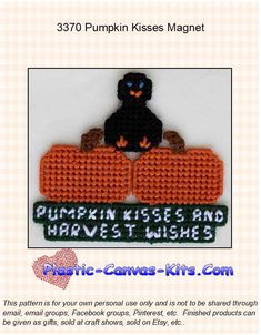 a black bear sitting on top of an orange pumpkin with the words pumpkin kisses and harvest's wishes