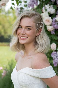 Discover the beauty of simplicity with these effortlessly simple wedding hairstyles that radiate elegance and charm. This stunning updo features soft waves delicately pinned and adorned with a fresh floral accent, perfect for the modern bride seeking a timeless look without the fuss. Embrace your natural beauty and make your wedding day unforgettable with these enchanting styles. Explore more inspiration! #weddinghairstyles #SimpleHair #FloralUpdo Floral Updo, United Nation, Simple Wedding Hairstyles, Beauty Of Simplicity, Front Face, Bride Nails, Soft Waves, The Modern Bride, Maybe Someday