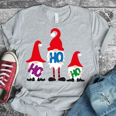 a t - shirt with the words ho hoo on it and three gnomes