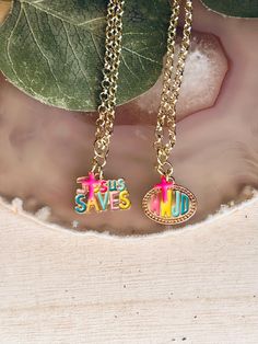 The adorable Jesus Saves and WWJD cross charm necklace is made with a chain and lobster claw clasp. This necklace is the perfect accessory for any tweens wardrobe.   This necklace is a great gift.  The necklace is an adjustable length of 16" to 18". Please be advised small parts can be a choking hazard and children shouldn't wear jewelry unsupervised. Crushedonjewelry assumes no responsibility for these items. Please be very careful. Cute Christian Necklaces, Wwjd Necklace, Spiritual Multicolor Cross Necklace, Christian Jewelry Necklaces, Cross Charm Necklace, Necklace Christian, Jesus Saves, Cross Charms, Boho Hippie