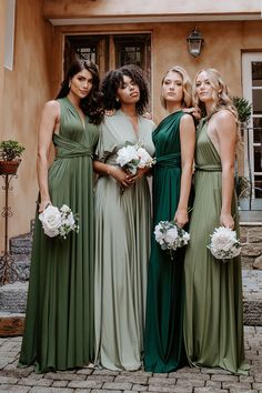 the bridesmaids are all dressed in green dresses