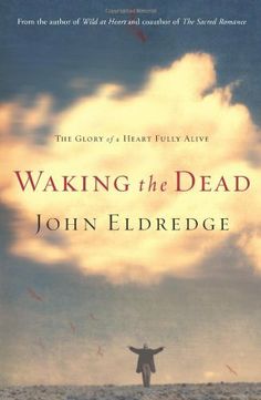 the book cover for waking the dead by john eldrege, with an image of a man standing on top of a hill