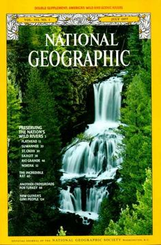 the front cover of national geographic magazine, featuring a waterfall in the woods