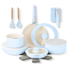 a set of blue and white dishes with utensils