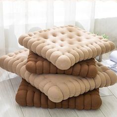 three pillows stacked on top of each other