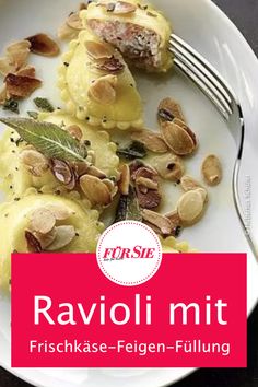 a white plate topped with ravioli and nuts