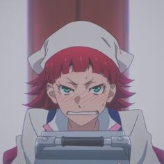 an anime character with red hair and green eyes holding a typewriter in front of her face