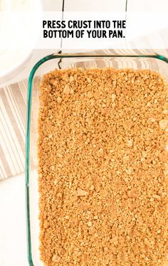 a casserole dish filled with oatmeal crumbs and the words press crust into the bottom of your pan