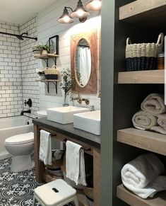 the bathroom is decorated in white and gray