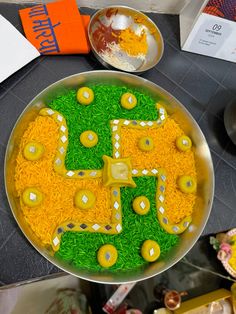 a cake decorated with yellow and green decorations