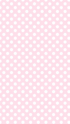 a pink and white polka dot background