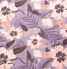 a purple and white floral print fabric