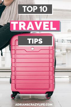 a woman sitting on top of a pink suitcase with the words top 10 travel tips