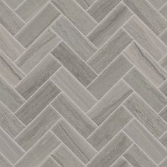 a herringle tile pattern in grey tones