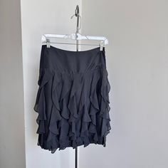 Y2K Waterfall Ruffle Silk Skirt in Grey Flounce around all spring and fall long in this cutie Lots of layered movement, looks cute with boots, docs, oxfords, or sneaks French Connection No Tag Size 100% Silk  Upper Waist 28" Lower Waist 32" Hip 40" Length 22" Docs Oxfords, Grey Silk Skirt, Vintage Mini Skirt, Gray Silk, Skirt Vintage, Silk Skirt, Gray Skirt, Ruffle Skirt, Vintage Skirt