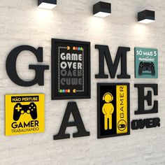 there are many different game related signs on the wall