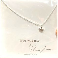 Authentic Disney Park Merchandise New In Package Disney Parks Collection Jewelry "Trust Your Heart" Princess Aurora Sleeping Beauty Crown Necklace Sterling Silver Very Delicate Design Crown Is 1/4 Inch Chain Is 15 + 3" New In Pack. Original Price $39.99. Disney Heart-shaped Jewelry Gift, Disney Heart Shaped Jewelry Gift, Disney Silver Jewelry For Birthday, Disney Style Silver Jewelry For Valentine's Day, Disney Silver Jewelry For Valentine's Day, Silver Disney Jewelry For Valentine's Day, Princess Style Silver Jewelry Gift, Disney Personalized Necklaces For Gifts, Disney Silver Necklace For Gift