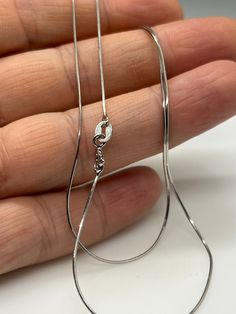 Thin Silver Herringbone Chain  / Thin Snake Chain Necklace  / 925 Sterling Silver / Italian Design Silver Chain / Gift for Her / Christmas Gift Material : 925 Sterling Silver Dimensions: Chain width: 0.8 mm,  length: 45 cm, weight: 1.7 gr Chain width: 1.5 mm, length: 45 cm, weight: 3.3 gr Our herringbone silver chain necklace is packed in a special jewellery box, so your item will make a perfect gift for someone you love. Polished solid silver. Keep it clean with a non-tarnishing cloth. Thank yo Italian Snake Chain, Silver Herringbone Chain, Snake Chain Necklace Silver, Silver Chains For Women Neck, Silver Chain Pendant Necklace, Silver Chain Design For Men, Silver Chains For Women, Silver Chain Design, Silver Anklets Designs